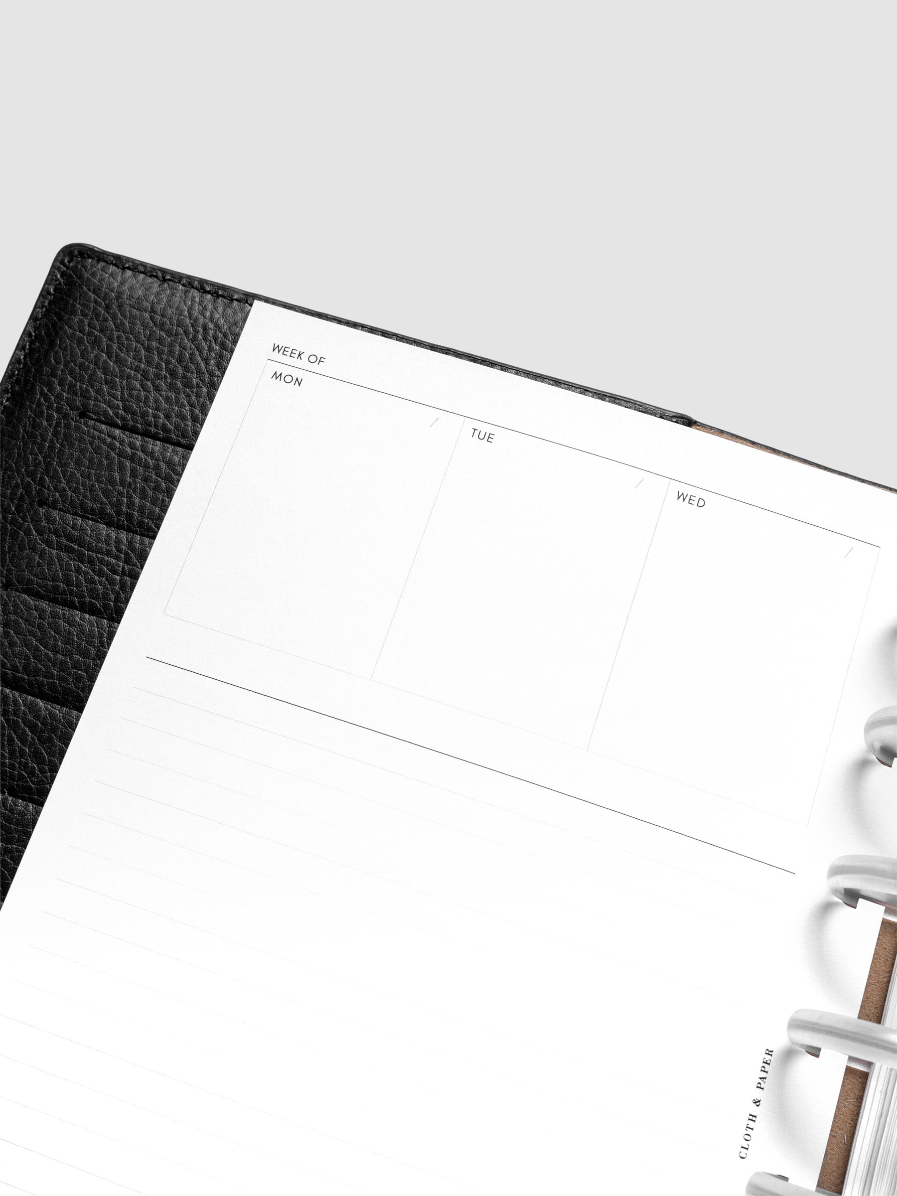 Close up view of the Undated Weekly Notes Planner Inserts showing a field for the week, sections for each day of the week, and a large lined notes section below.