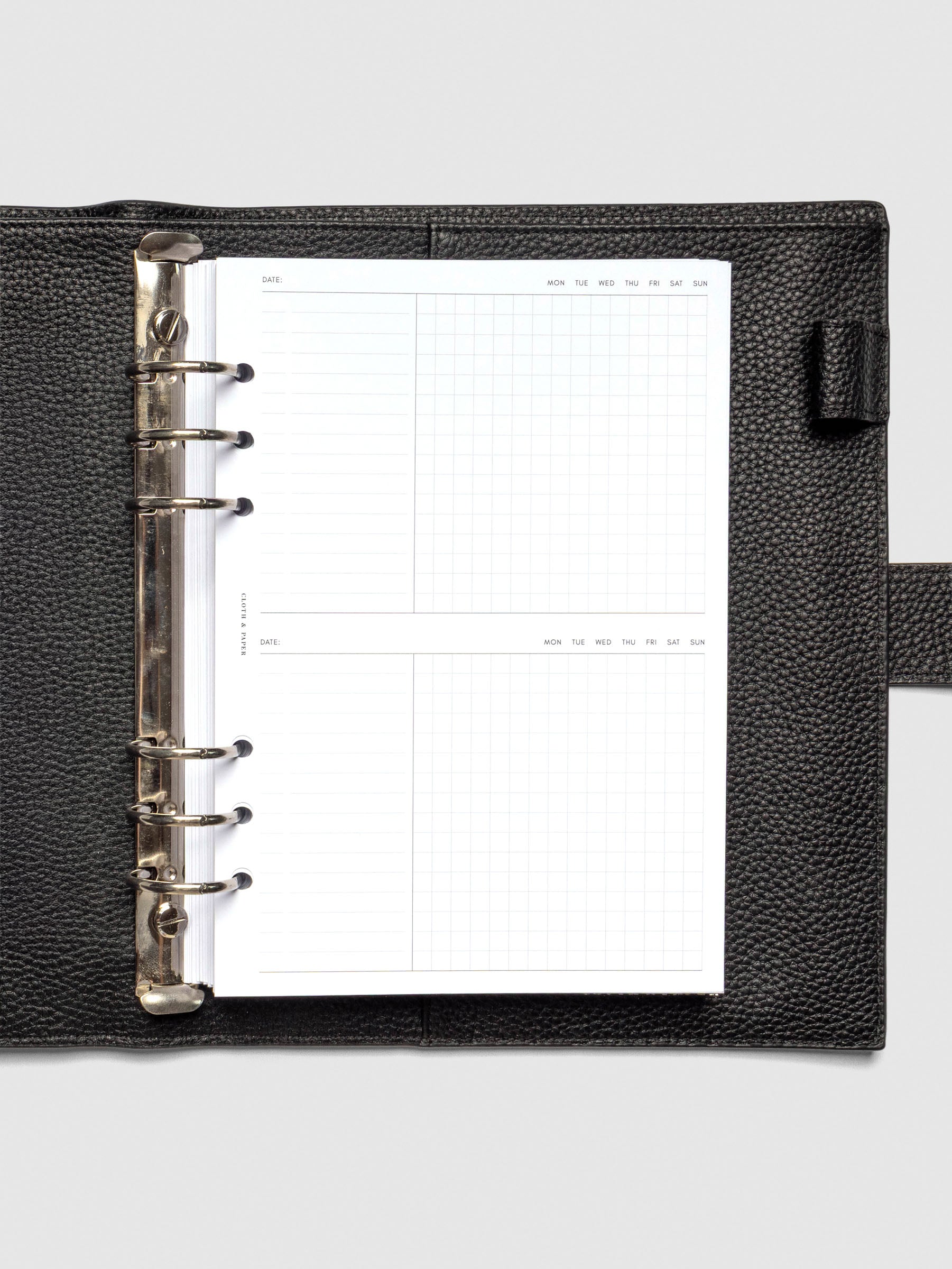 Insert in use inside a black leather planner.