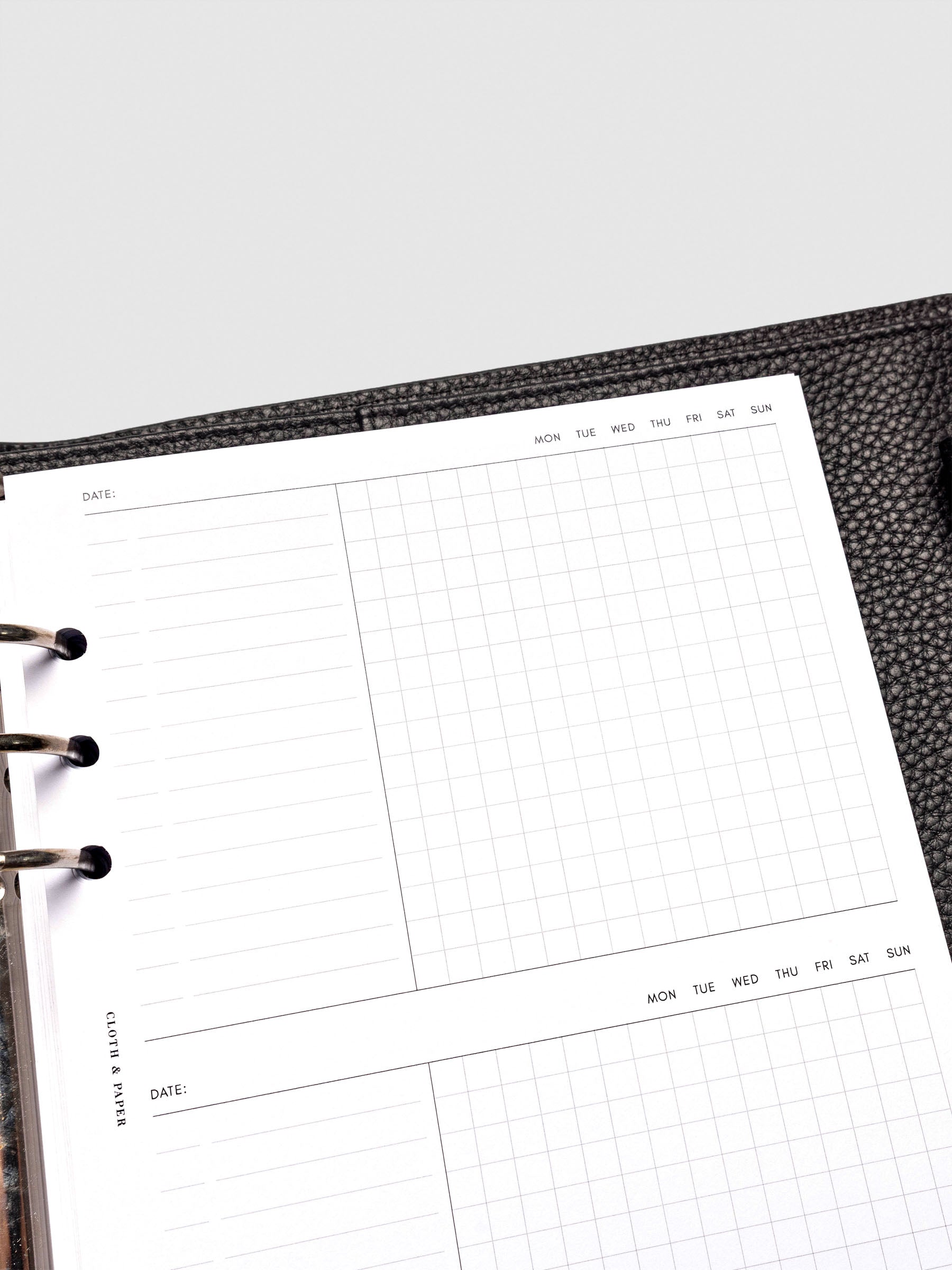 Insert in use inside a black leather planner.