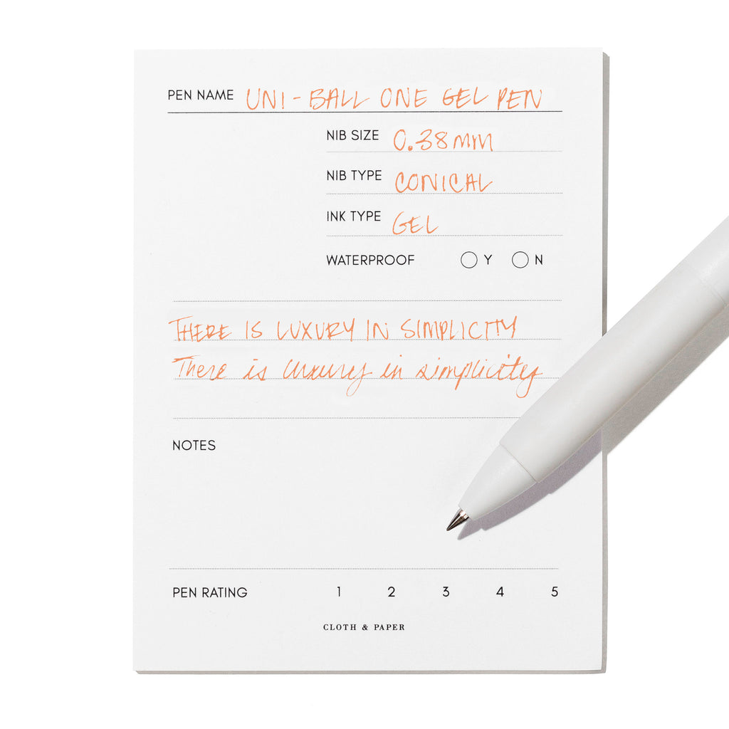 Pen tilted slightly to the right on a white background. Color pictured is Mango Orange.
