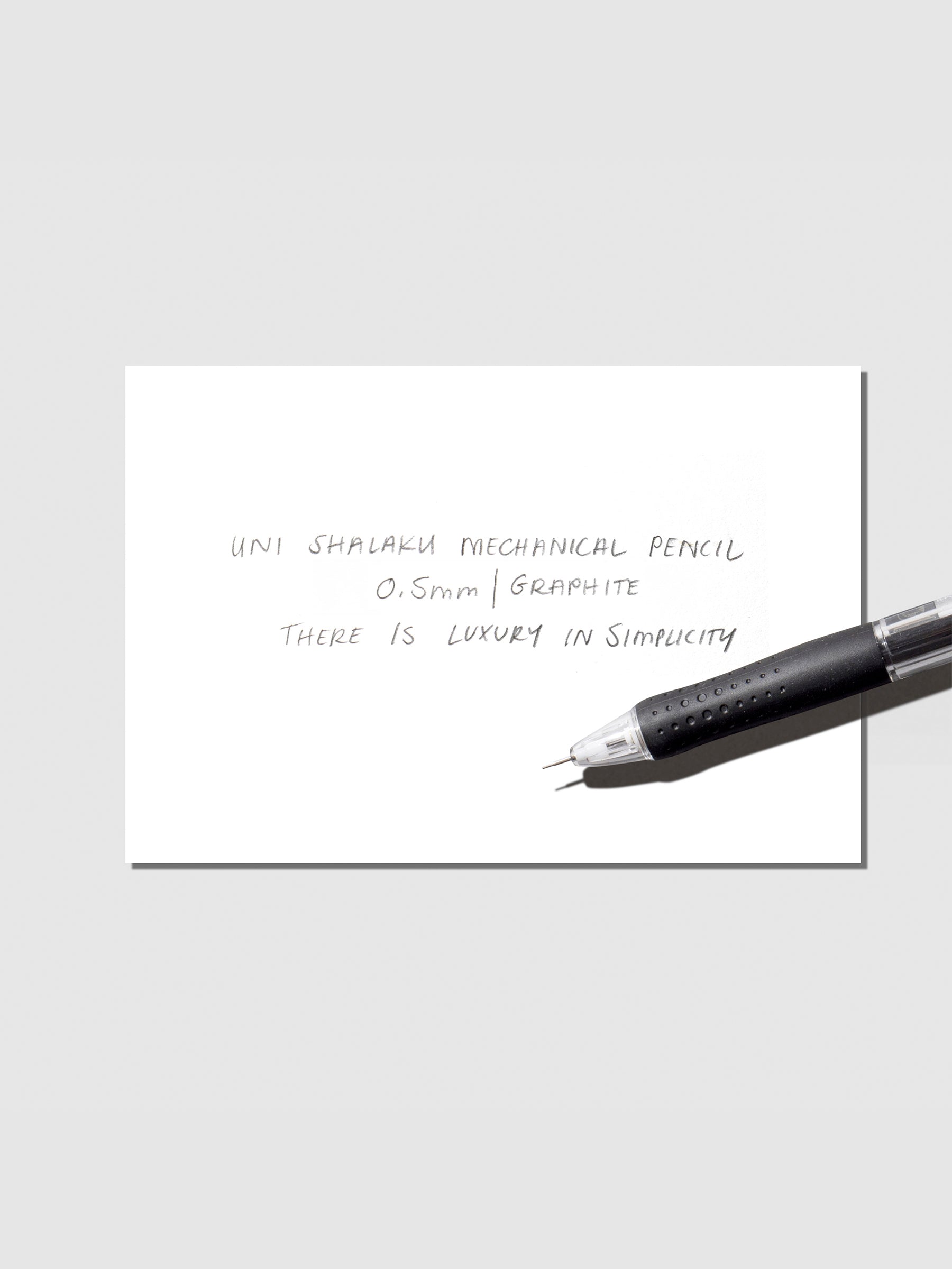 Pen displayed on top of an in use pen testing sheet.