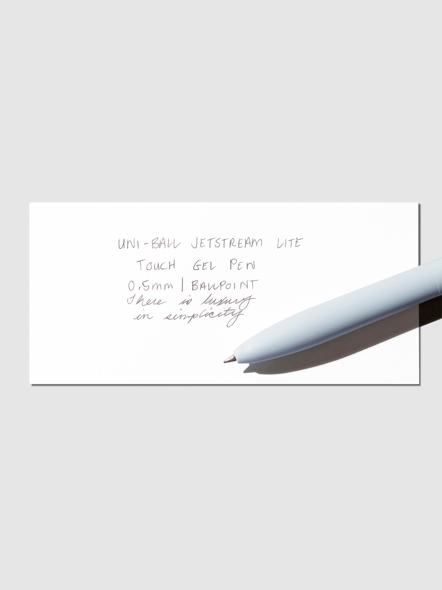 Image shows a pen test sheet of the Uni-ball Jetstream LiteTouch Gel Pen in Light Blue.