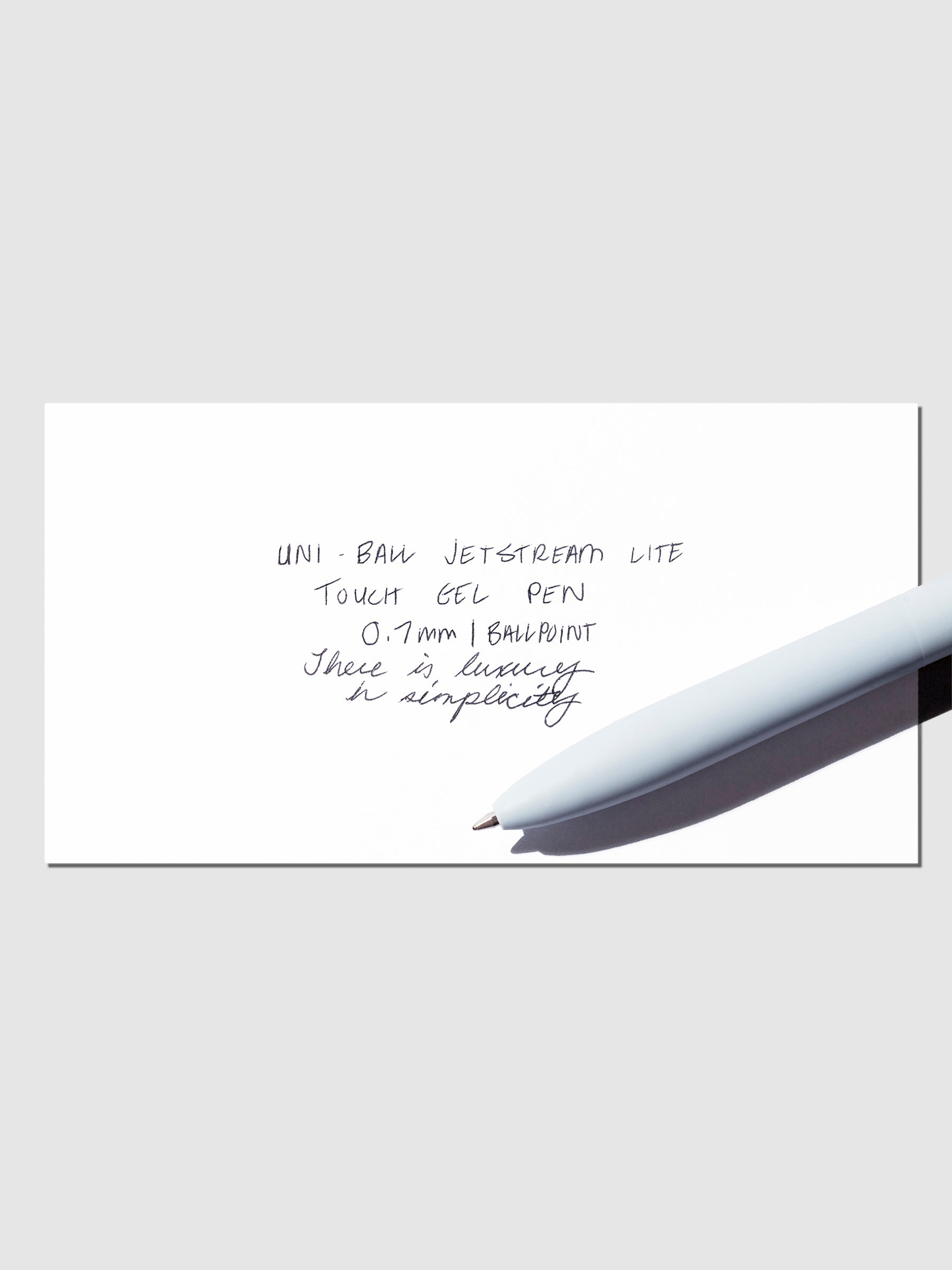 Image shows a pen test sheet of the Uni-ball Jetstream Lite Touch Gel Pen in Light Blue.