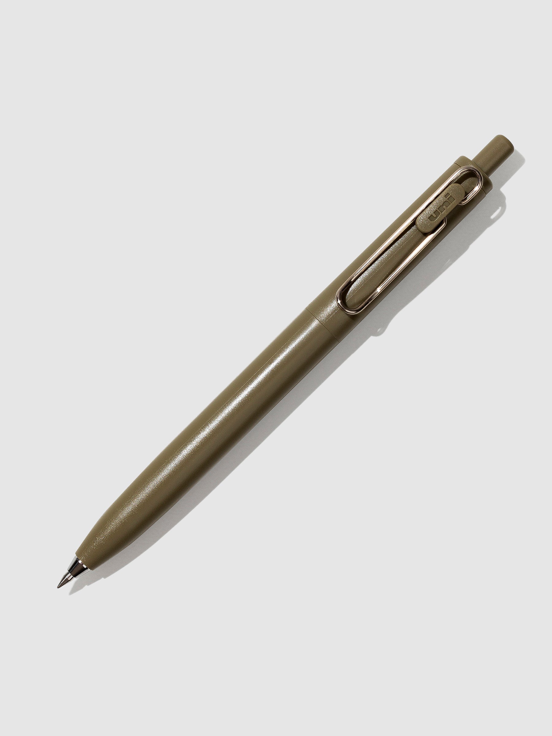 Olive pen turned to the right against a neutral background.
