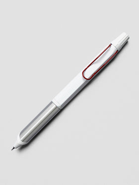 Ballpoint multi-pen with white body, silver grip, and red clip shown at an angle on a grey background.
