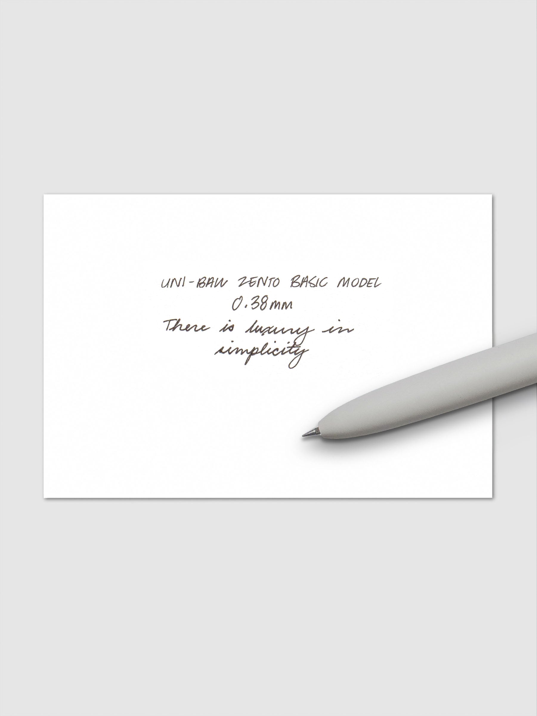 Handwritten writing sample using the Uni-ball Zento Basic Model Pen in Black with nib size 0.38 mm.