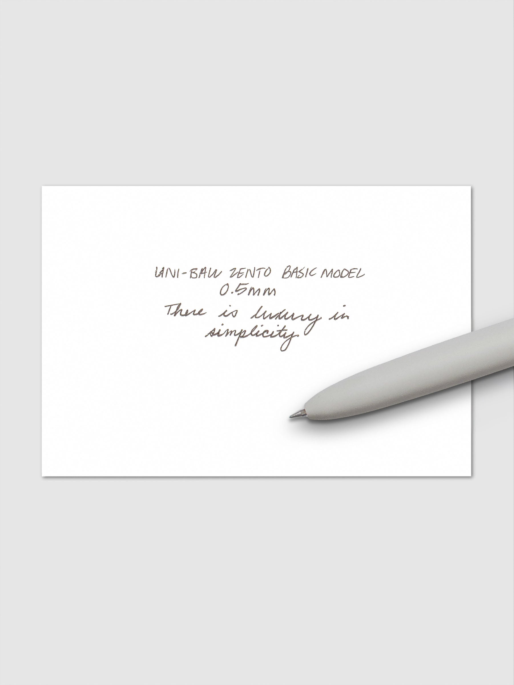 Handwritten writing sample using the Uni-ball Zento Basic Model Pen in Black with nib size 0.5 mm.