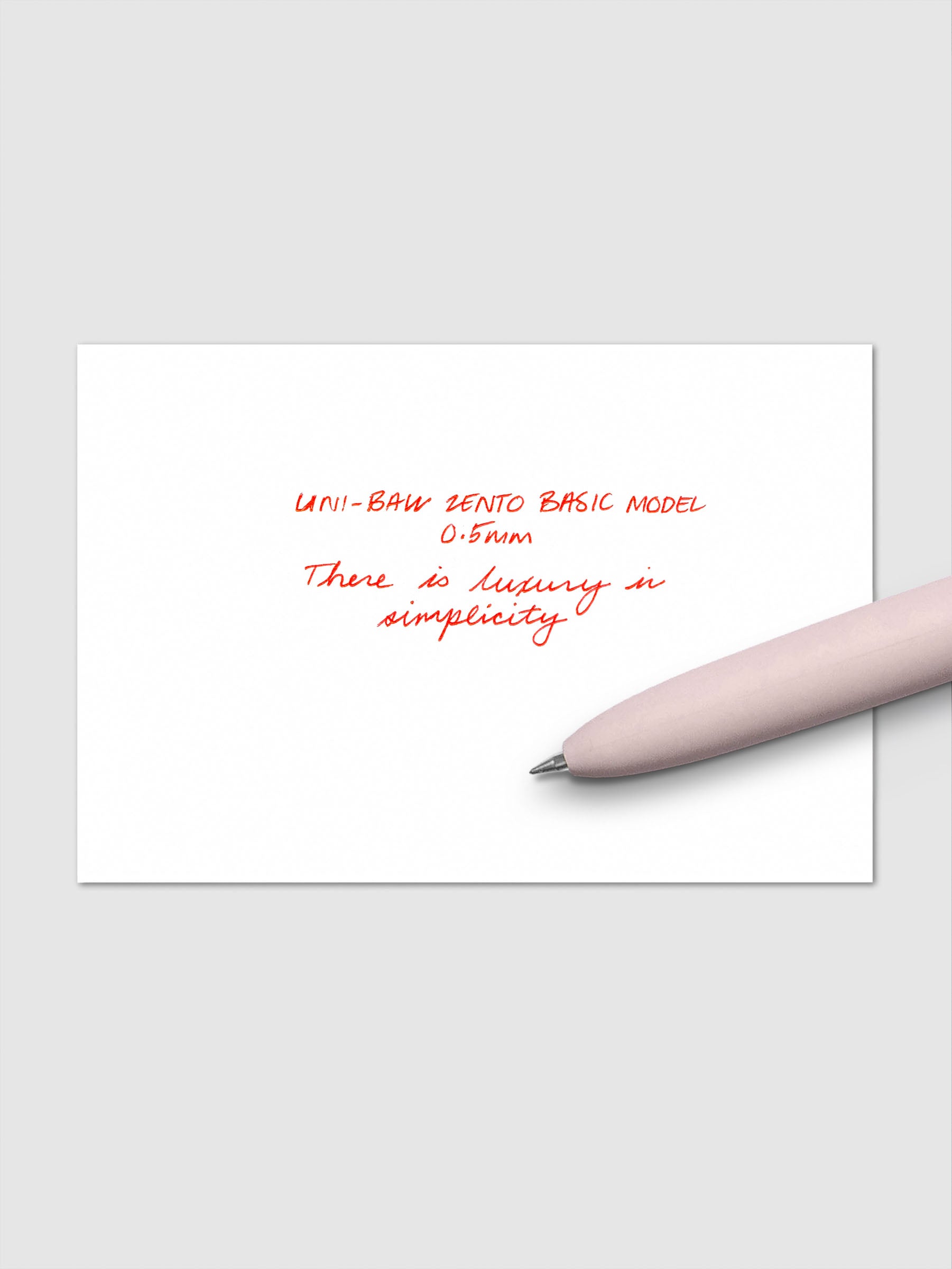 Handwritten writing sample using the Uni-ball Zento Basic Model Pen in Red with nib size 0.5 mm.