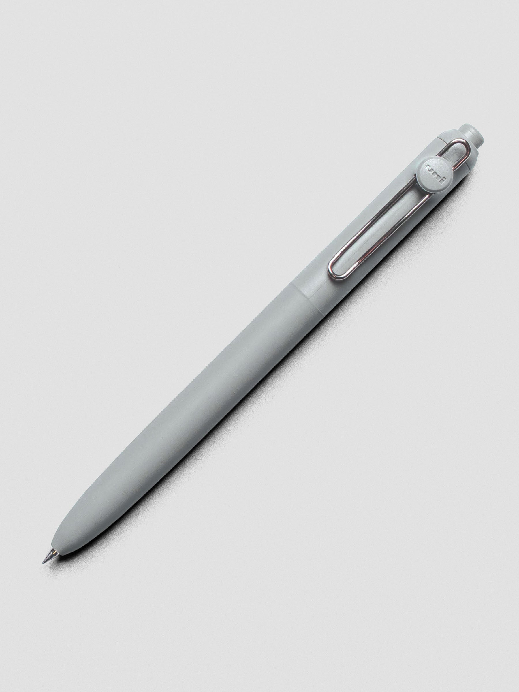 Grey pen with a silver clip shown at an angle.