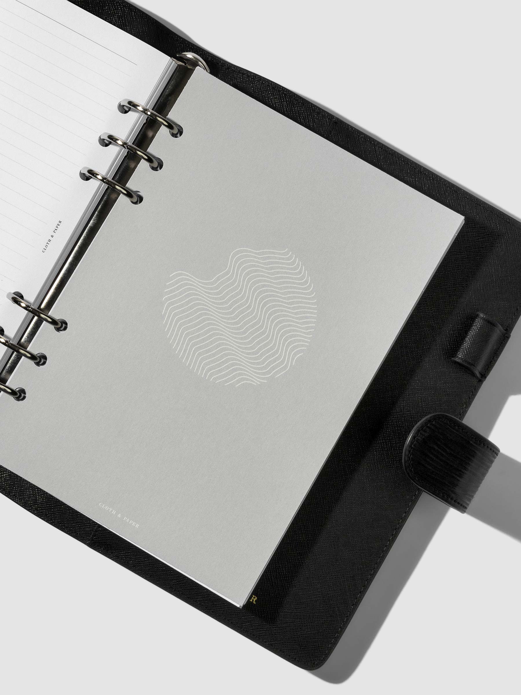 Dashboard in use inside a leather agenda.