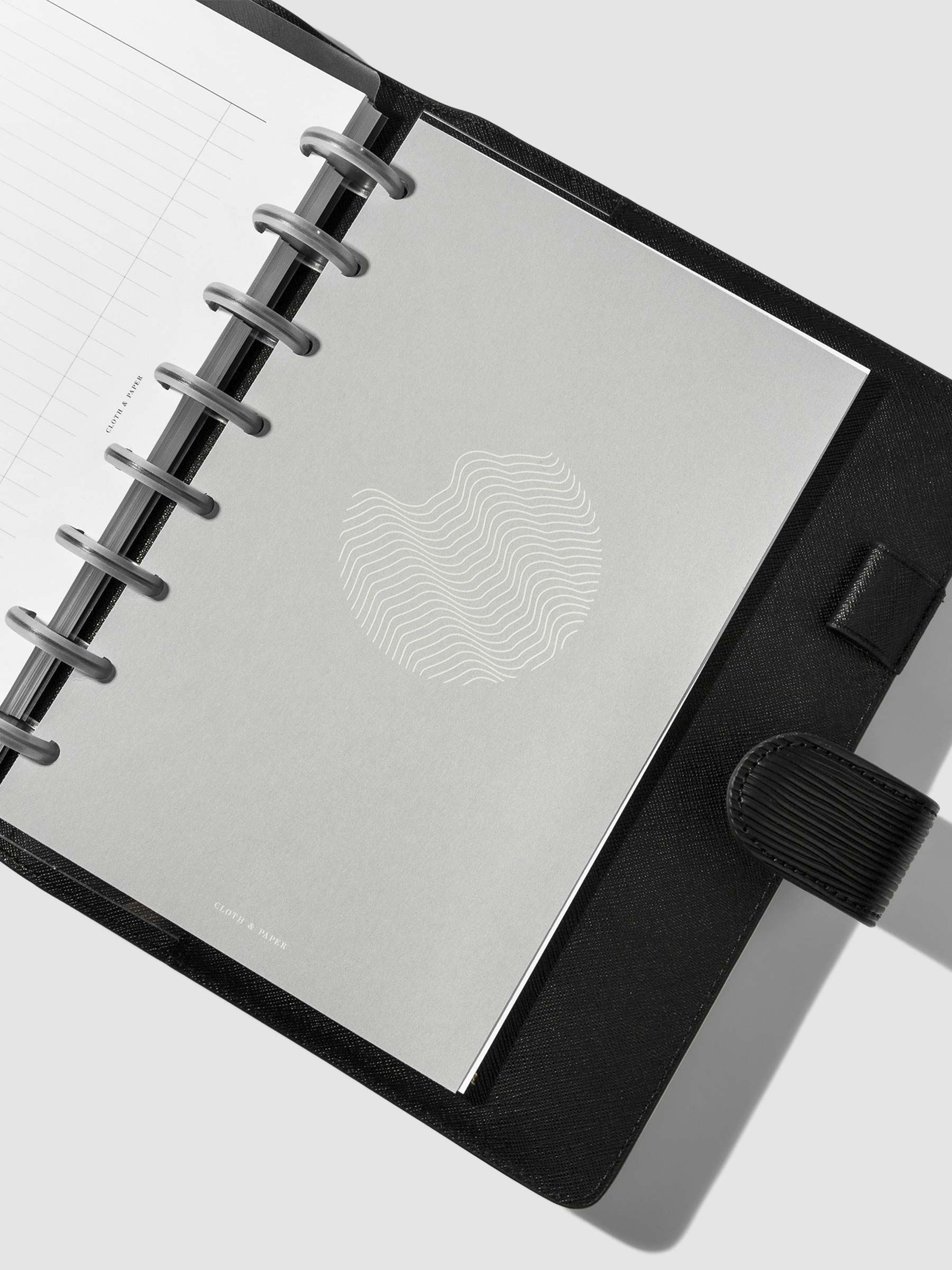 Dashboard in use inside a leather planner.