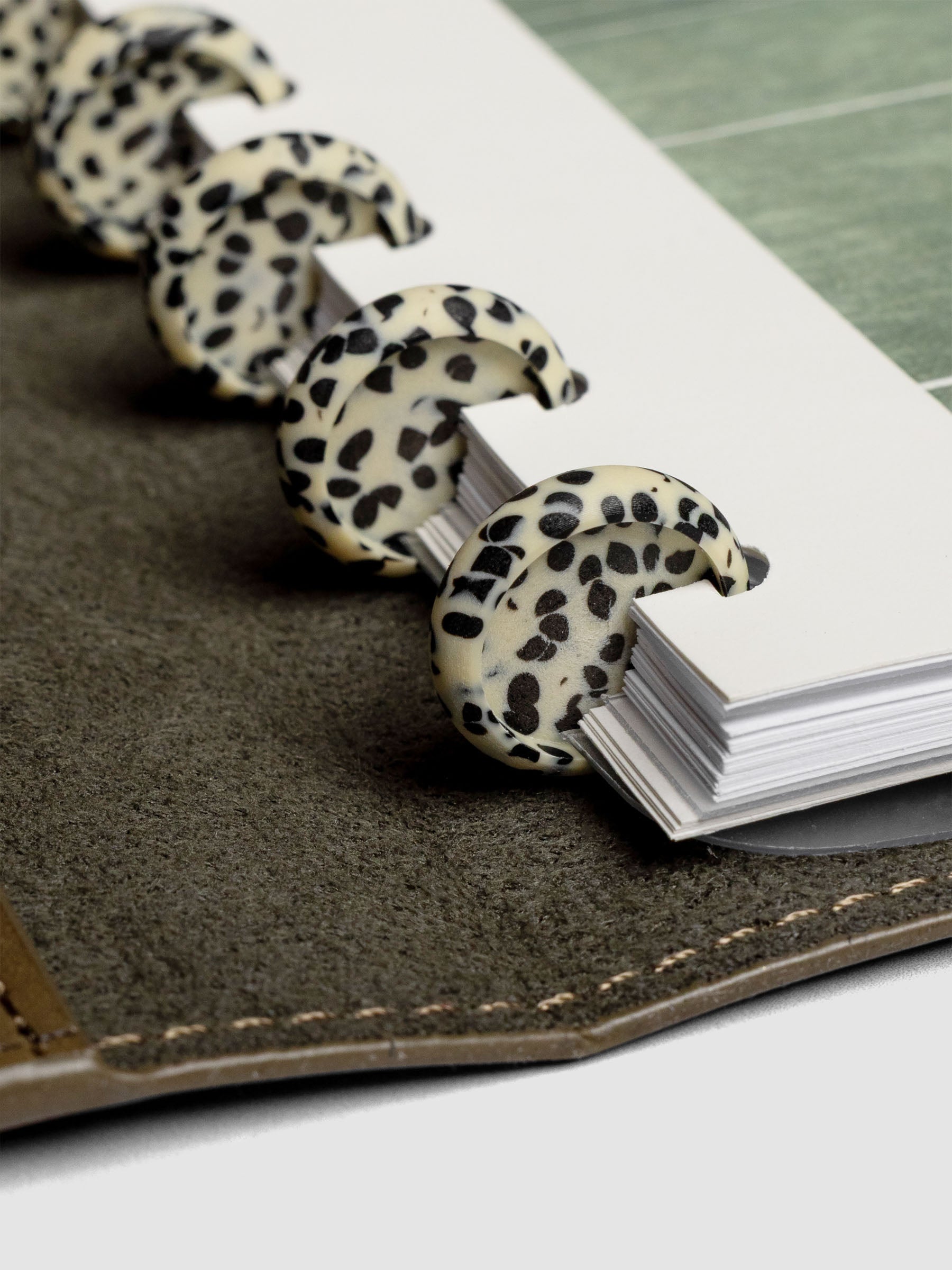 0.75 Inch Speckled Planner Discs shown in use.