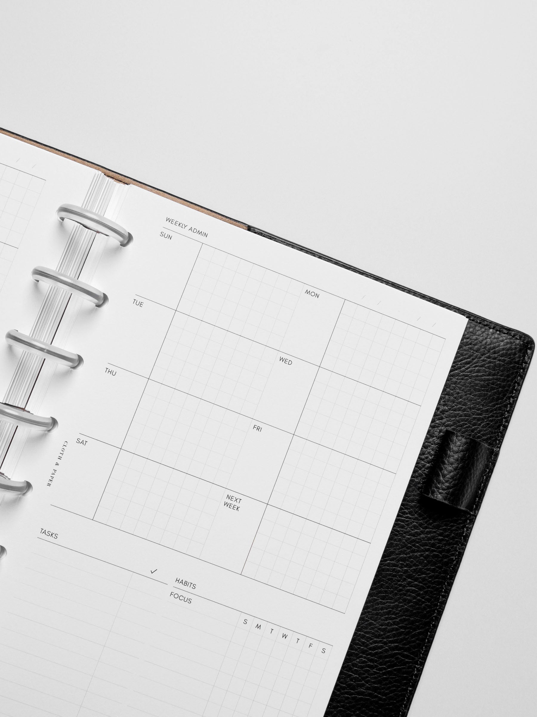 Insert in use inside a black leather planner.