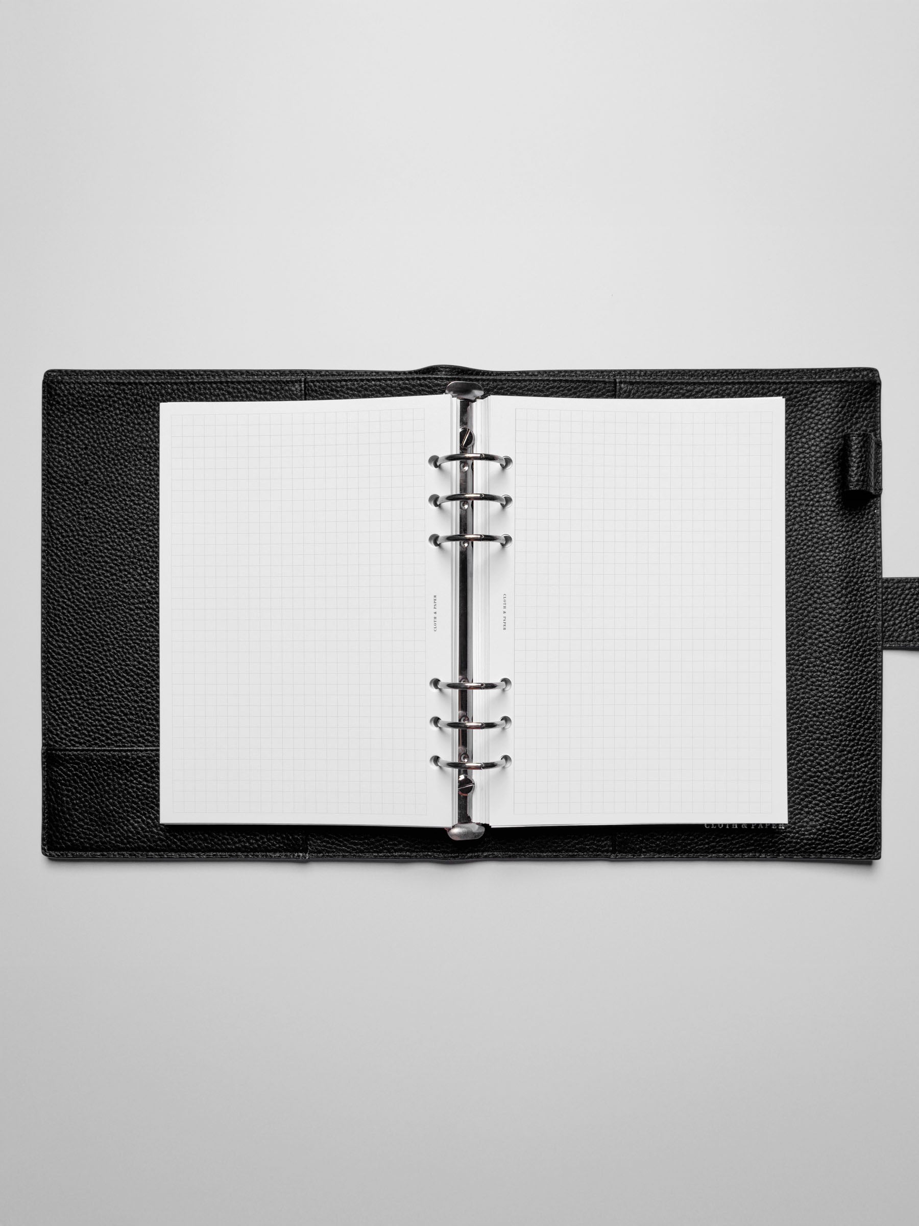 Insert in use inside a black leather planner.