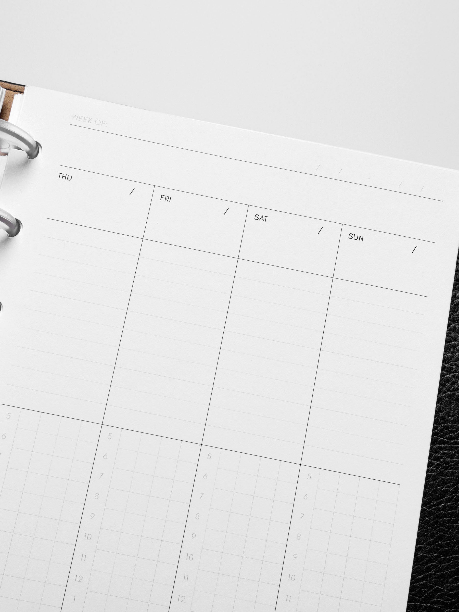 Insert in use inside a black leather planner.