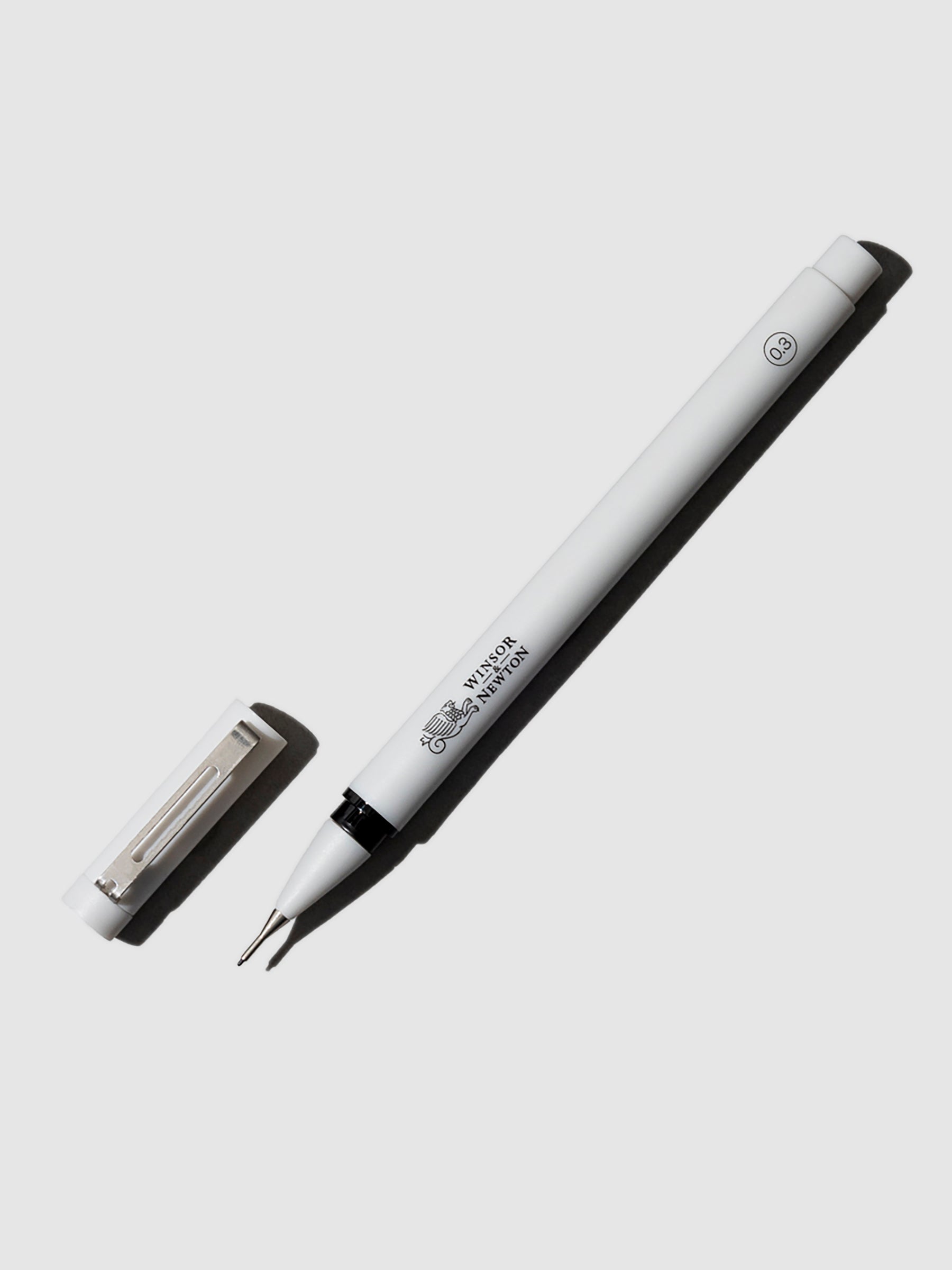 Pen displayed uncapped on a neutral background.