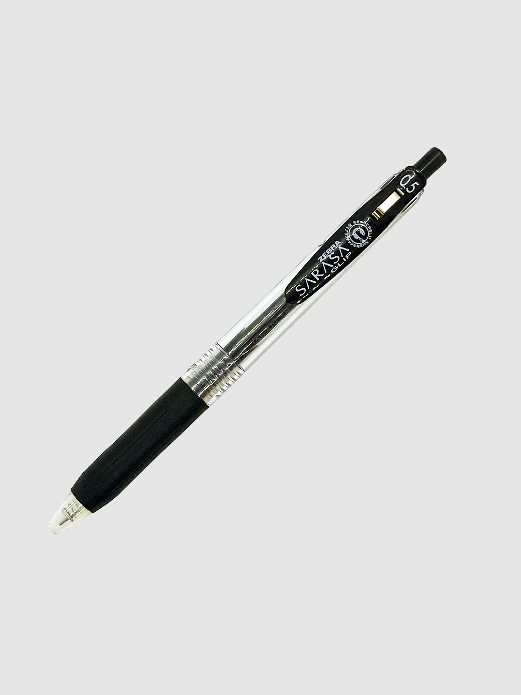 Zebra Sarasa Clip, 0.5 mm, Black, Cloth and Paper. Pen turned to the right against a neutral background.