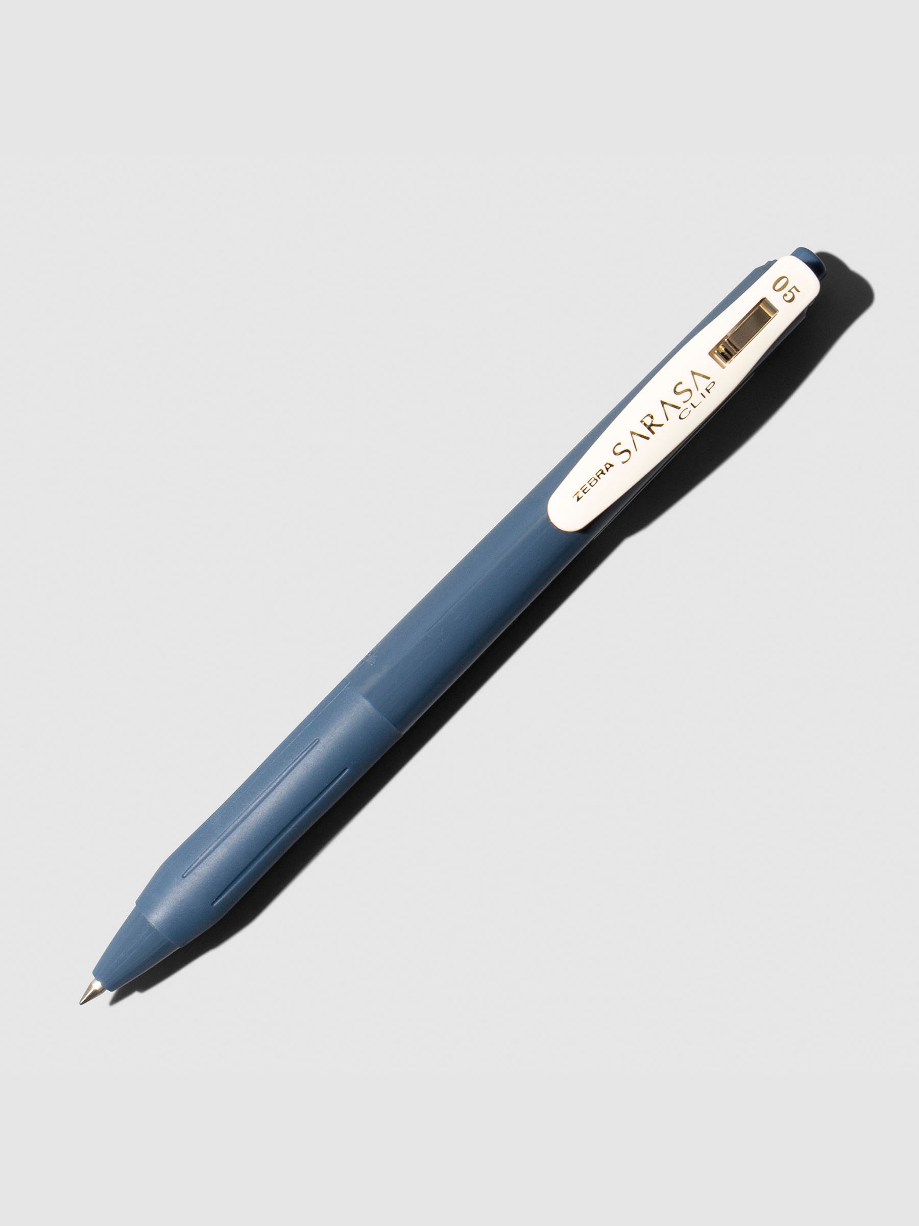 Pen displayed on a neutral background. Color shown is Blue Grey.