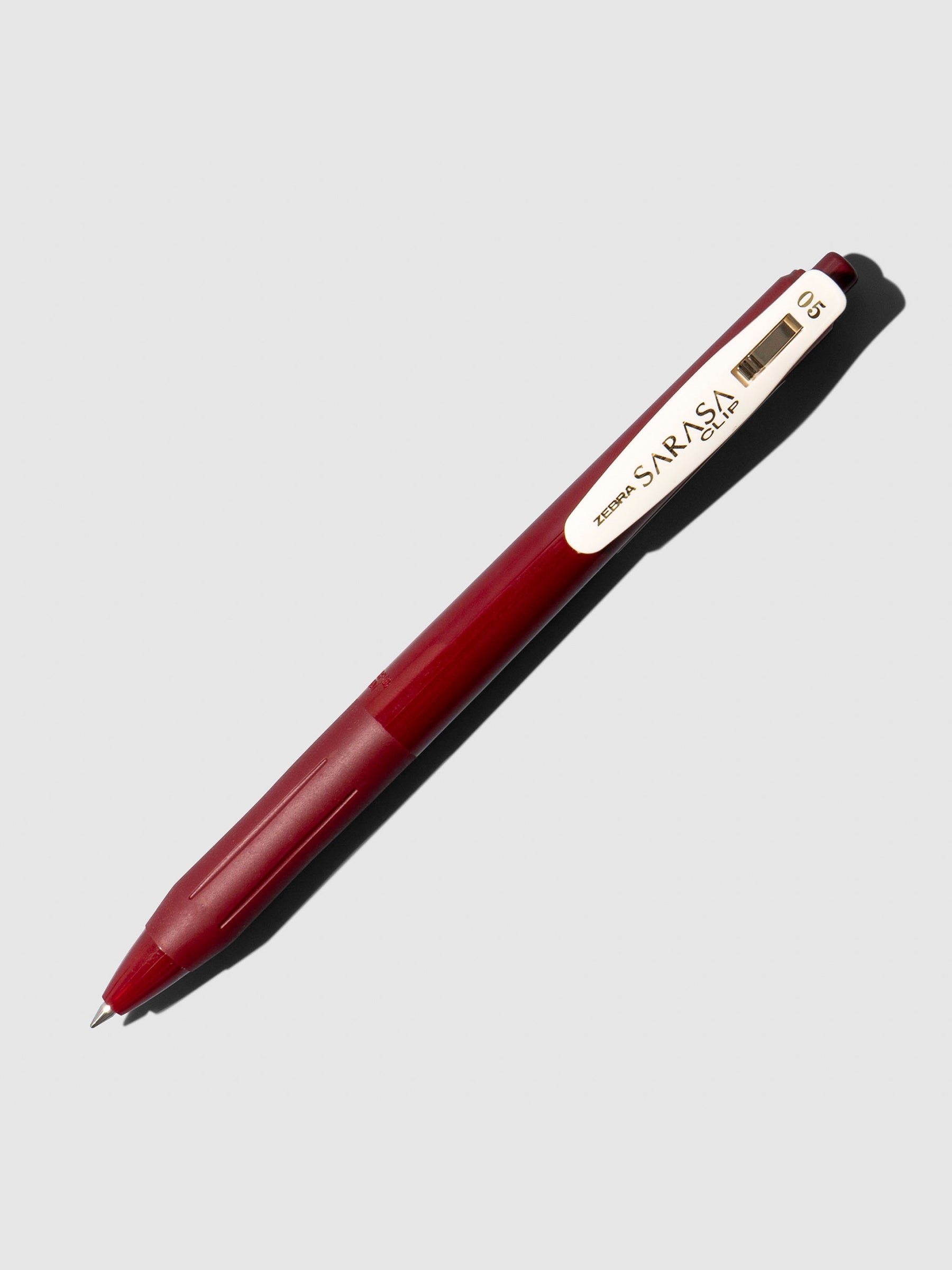Pen displayed on a neutral background. Color shown is Red Black.