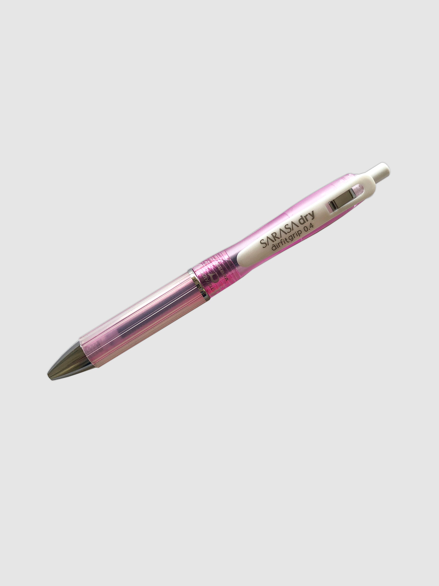 Zebra Sarasa Dry Airfit Grip Rollerball Pen, Pink, 0.4mm, Cloth & Paper. Pen turned to the left against a neutral background.