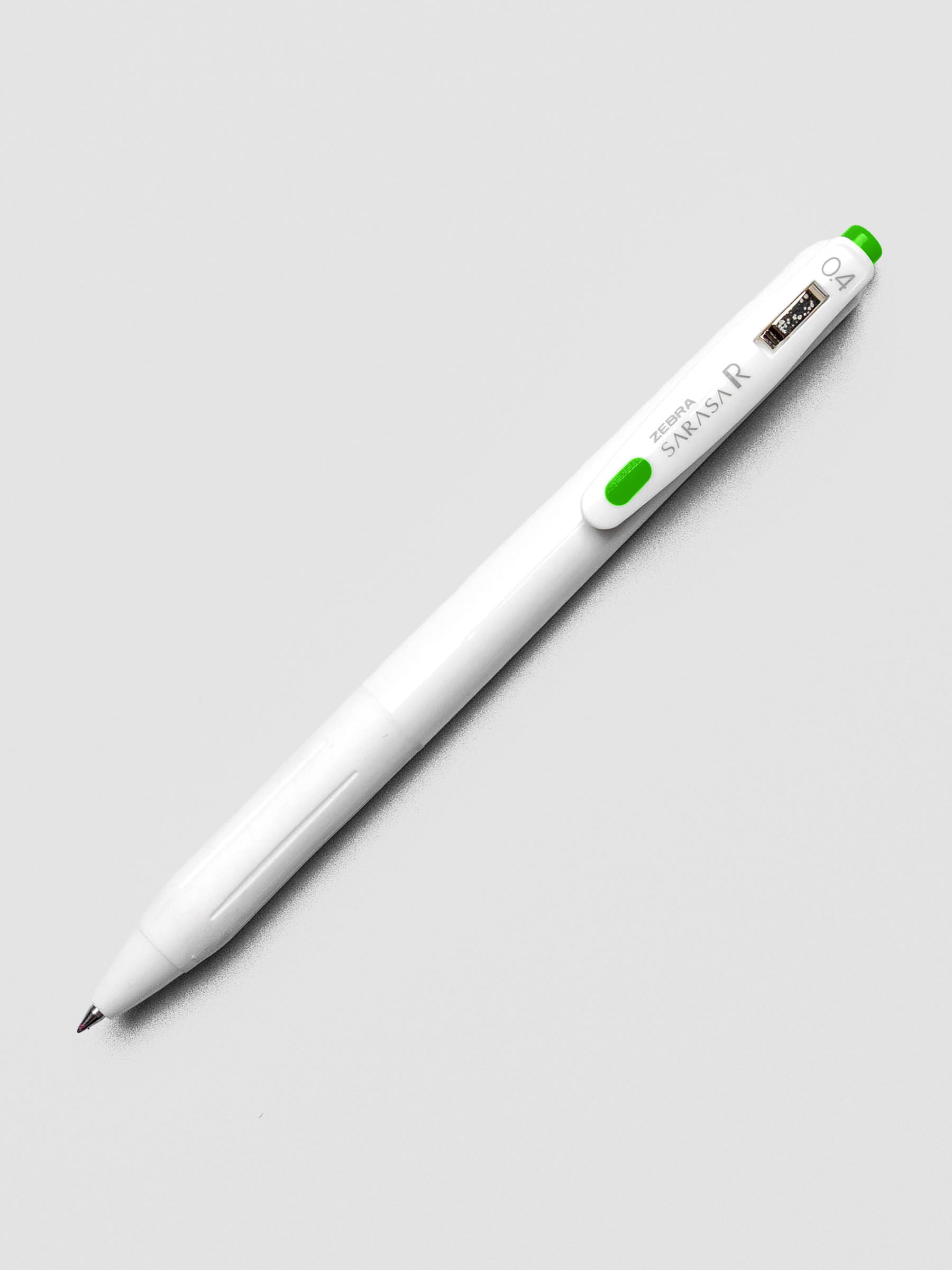 Zebra Sarasa R 0.4mm pen in fresh green ink with matching clip, shown on a white background.