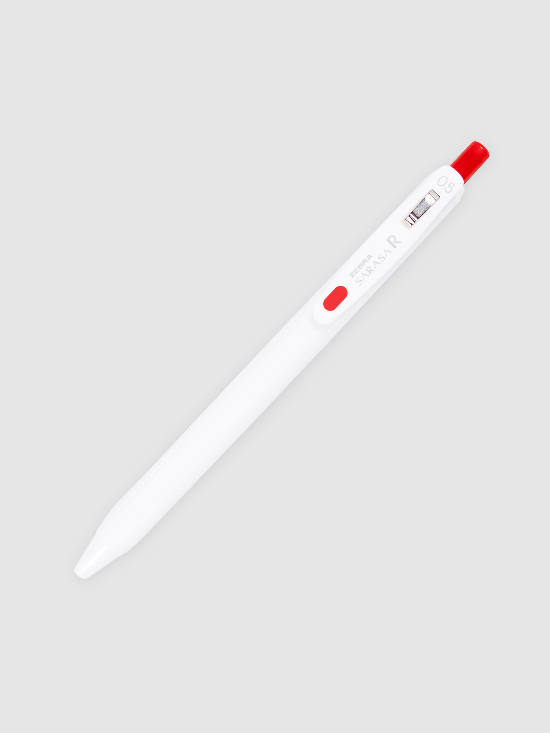 Zebra Sarasa R Pen, 0.5 mm, Red, Cloth and Paper. Pen turned to the right against a neutral background.