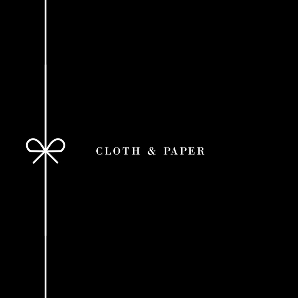 Cloth and Paper Gift Card. Cloth and Paper logo displayed in white text on a black background. There is a vertical bow design to the left.
