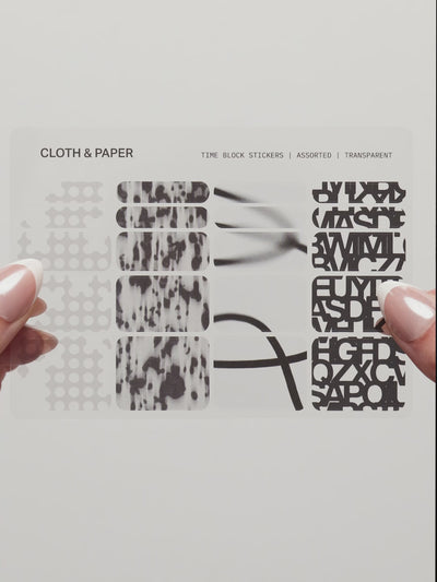 Time Block Stickers sheet with four transparent designs, Punched Holes, Blurred Ink, Blurred Line and Precision letterforms