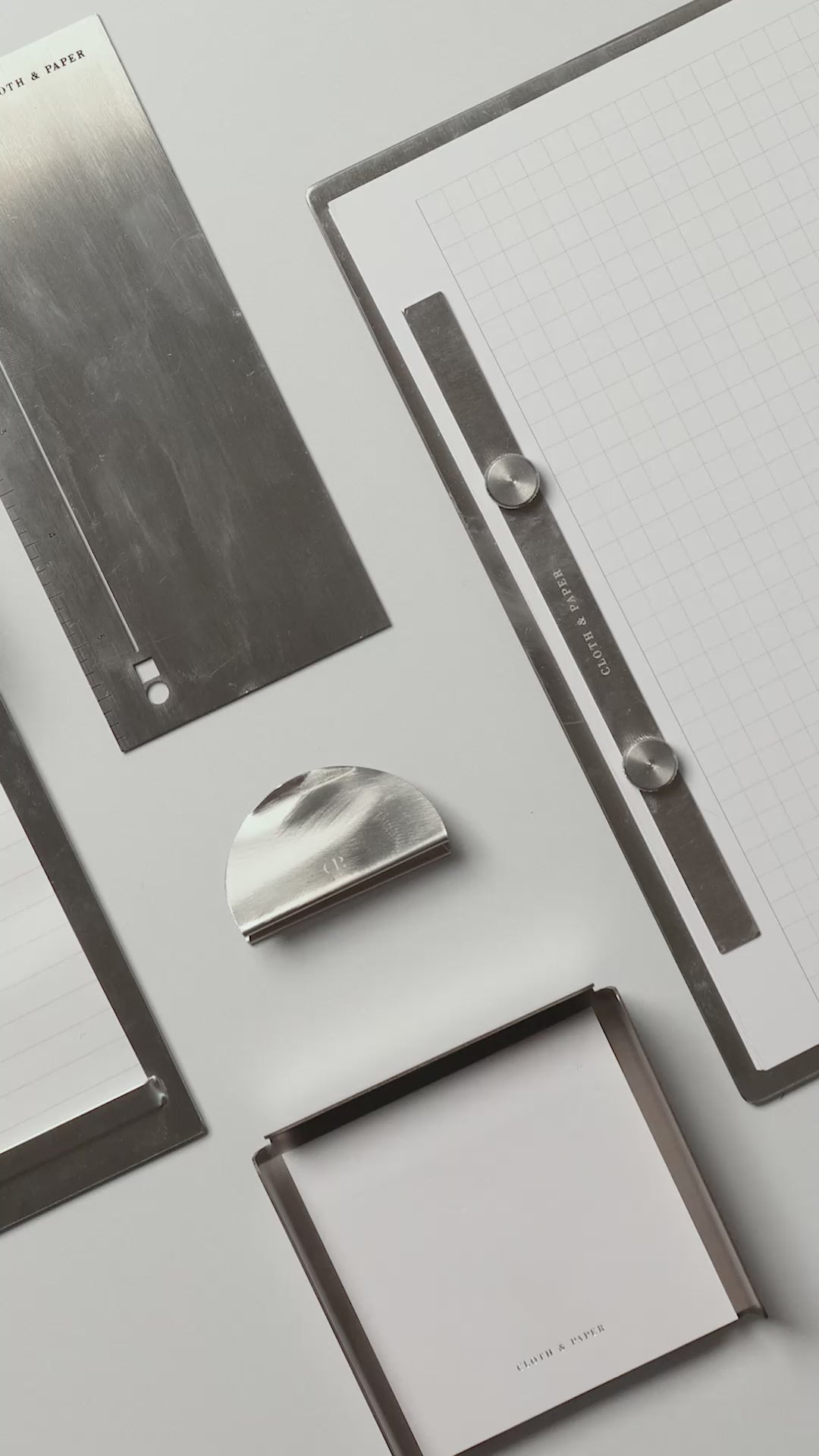 Cloth & Paper Metal Clip Stand shown with other metal products.