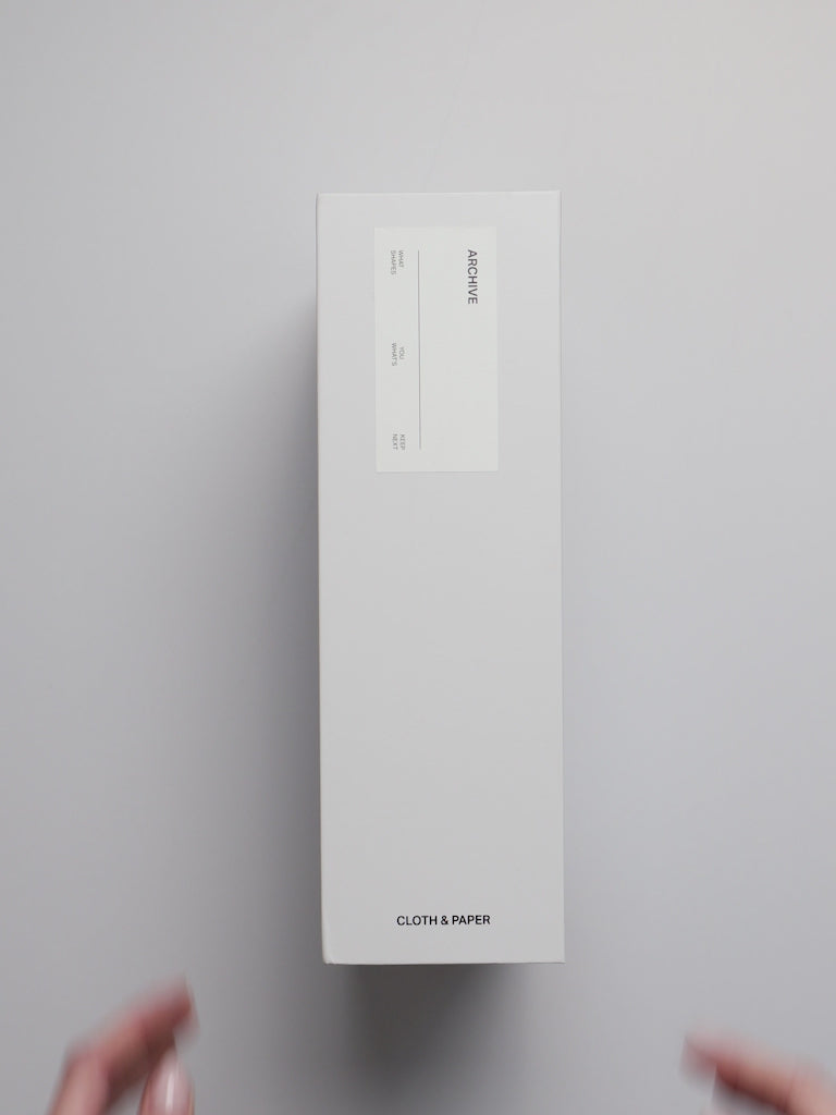 Storage Book 4.0 shown in use with various Cloth & Paper products stored inside.