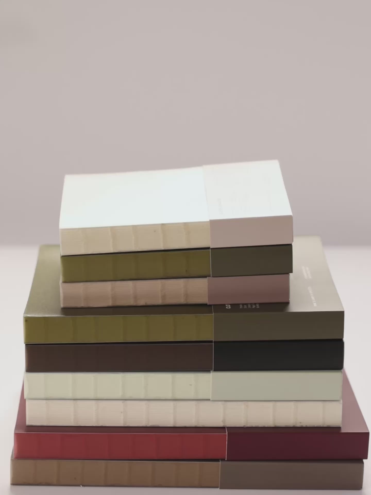 Opening and flipping through various sizes and layouts of the Perfect Bound Notebook series.