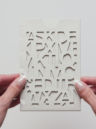 The A5 6-Ring Punch Diecut Pocket Folder video, showing the front panel cut through with the Precision letter pattern and the half moon notch at the top