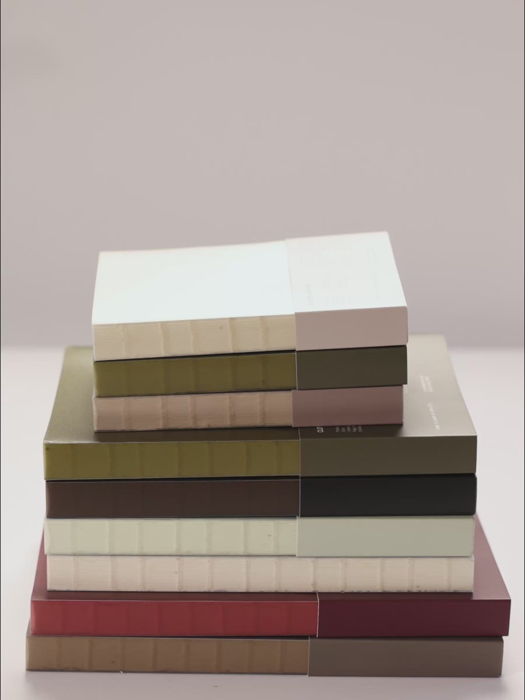 Opening and flipping through various sizes and layouts of the Perfect Bound Notebook series.