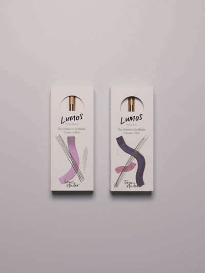 Tom's Studio Lumos Pen's being opened and shown in use, highlighting the dual tip functionality.