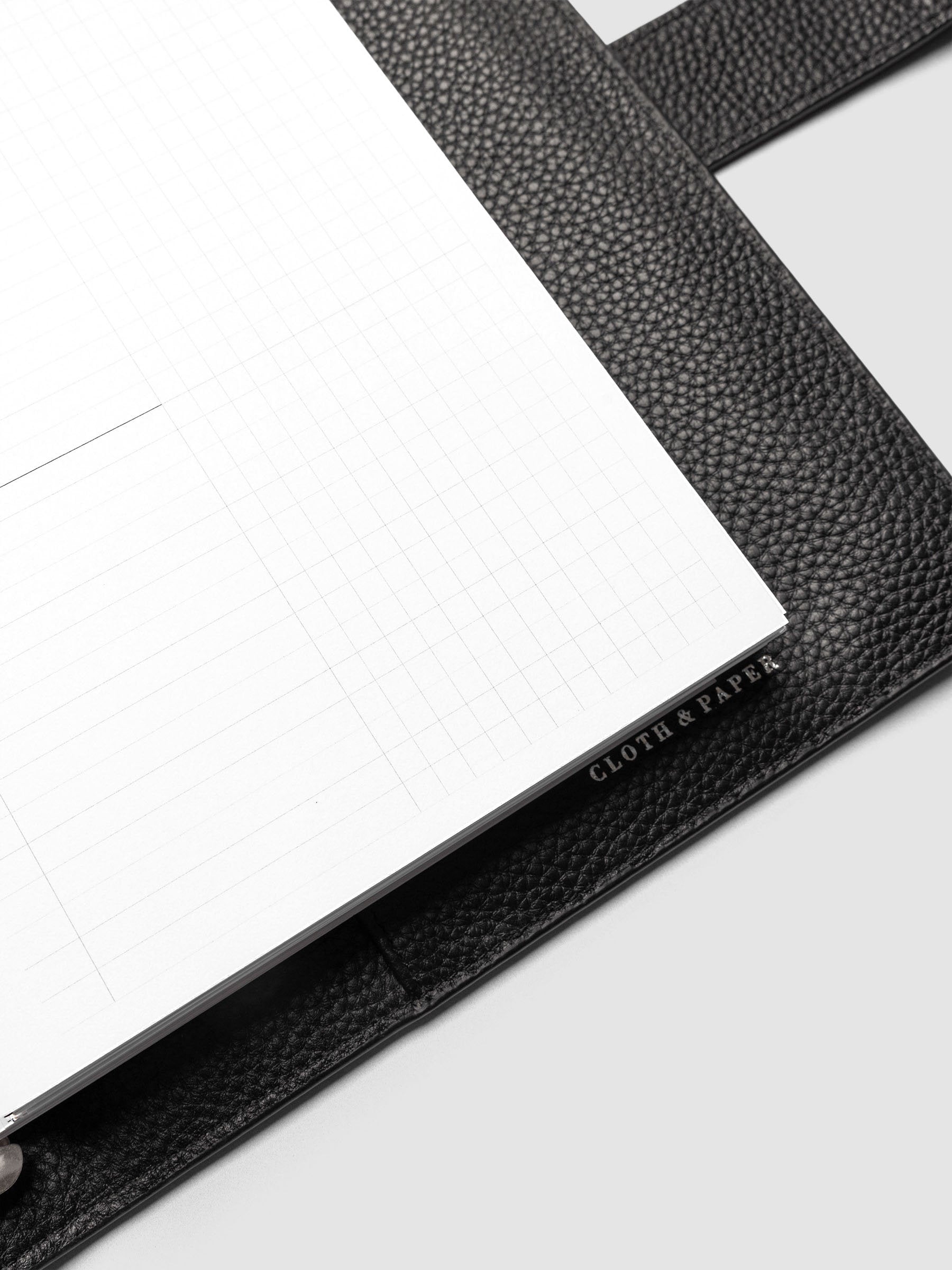 Daily Workflow Planner Inserts, A5 6-Ring Punch, close-up of the bottom of the blank right page showing the graph layout inside a planner