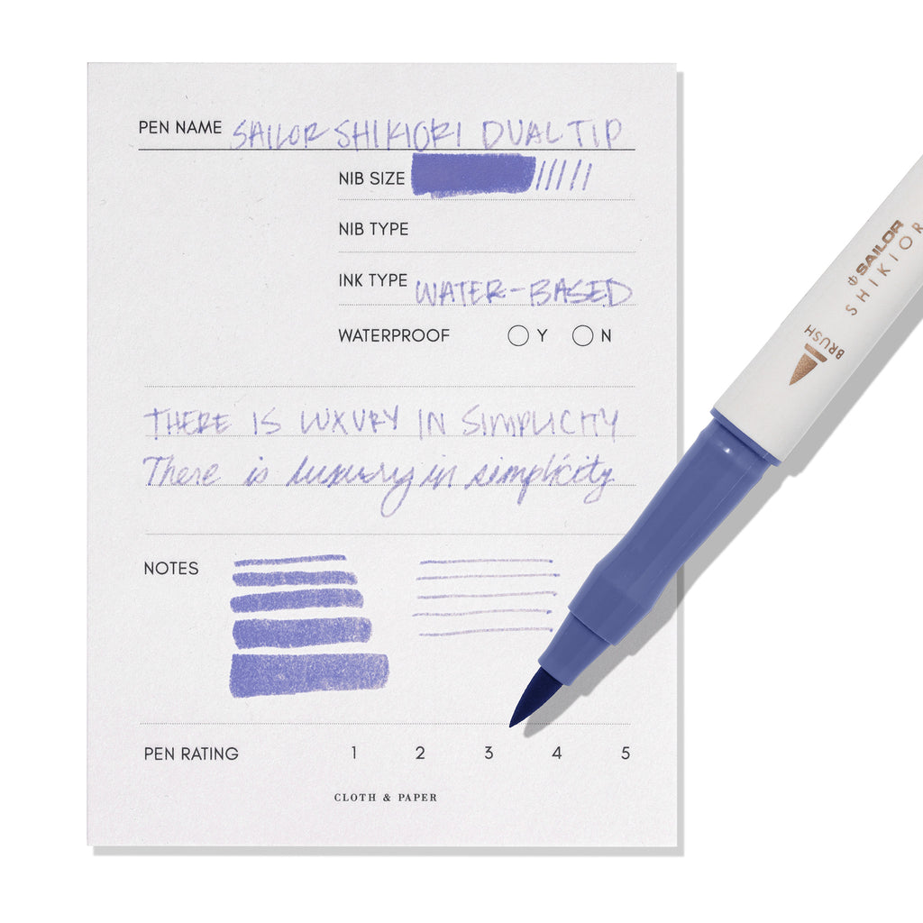Pen displayed next to in use pen test sheet. Color pictured is Nioisumire. 