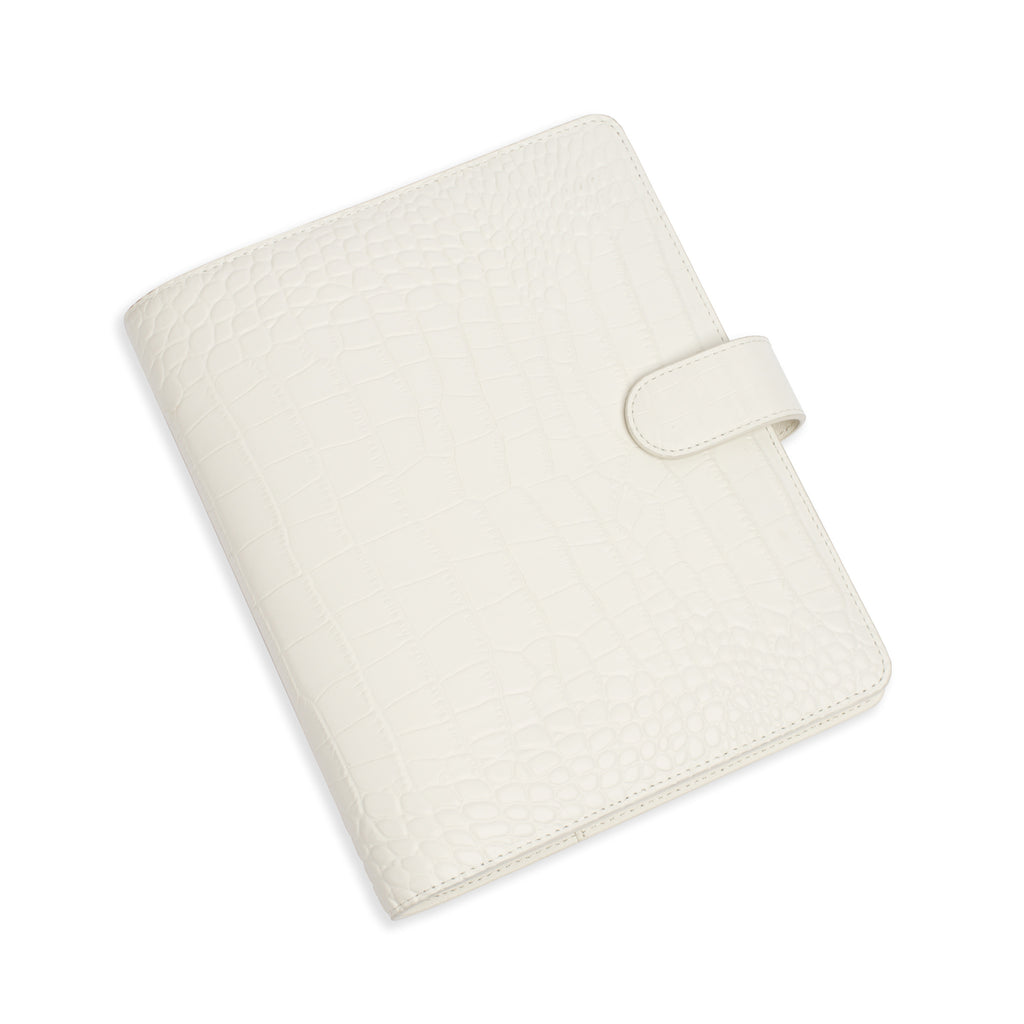 Agenda Cover in size Large with White Croc Leather closed to show front cover, turned to the left against a white background.