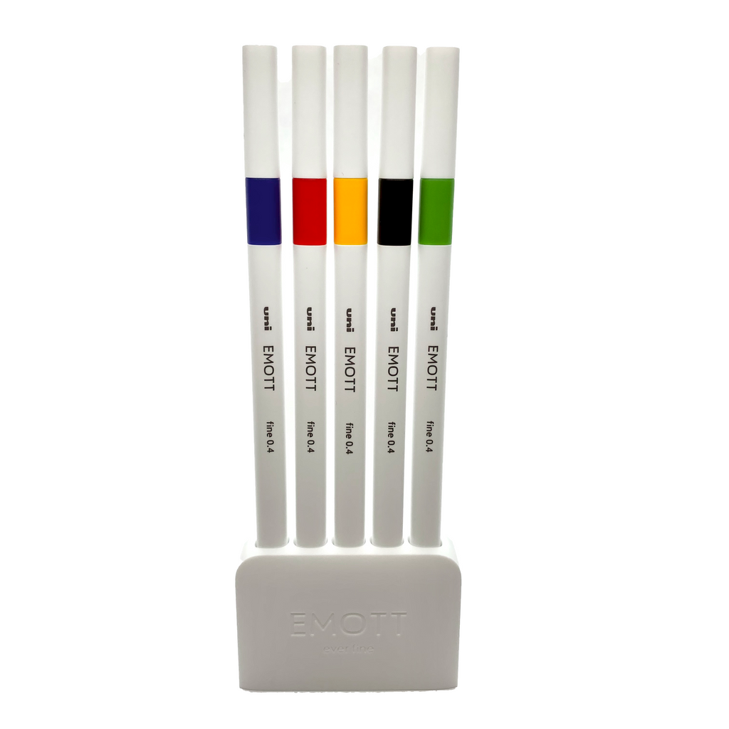 Uni Emott Ever Fine, 5 Color Set No. 1, Vivid, Cloth and Paper. Pens resting in their pen stand against a white background.