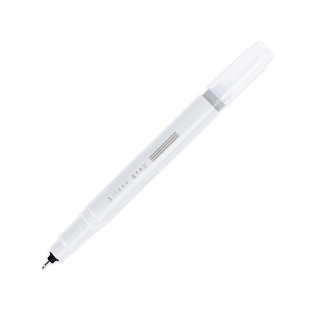 Fineliner marker in Silver Gray with nib exposed and cap posted to the end of its barrel on a white background.