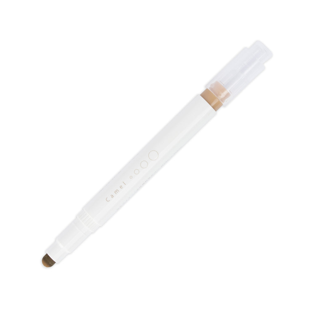 Camel highlighter with tip exposed and cap posted to the end of its barrel on a white background.