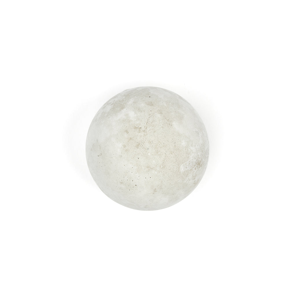 Paperweight seen from a top-down angle on a white background.