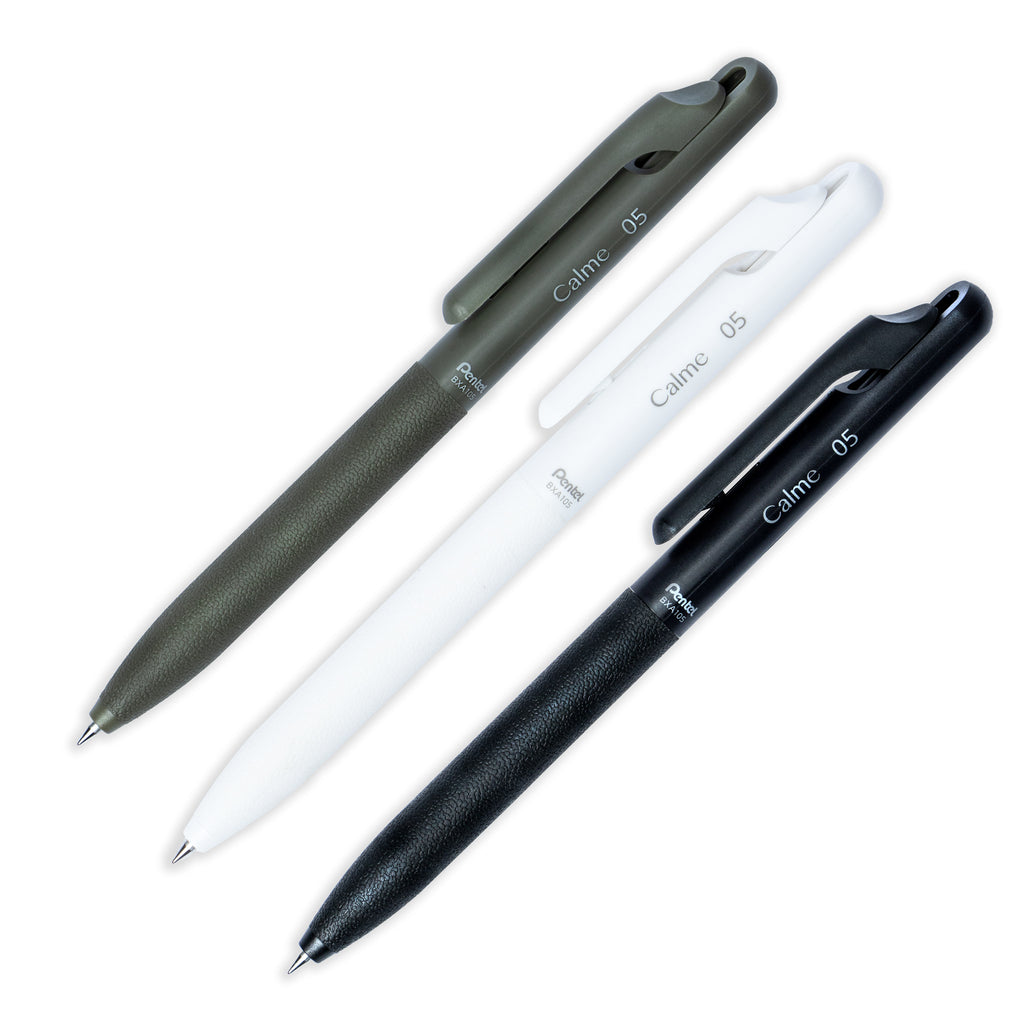 One of each color of the Pentel Calme Ballpoint Pen with a 0.5 mm nib resting perpendicular to each other, spaced evenly and angled to the right against a white background.