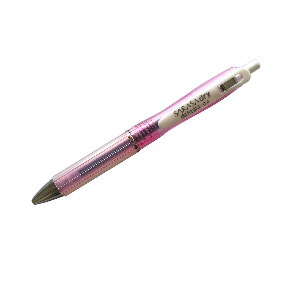 Zebra Sarasa Dry Airfit Grip Rollerball Pen, Pink, 0.4mm, Cloth & Paper. Pen turned to the left against a white background.