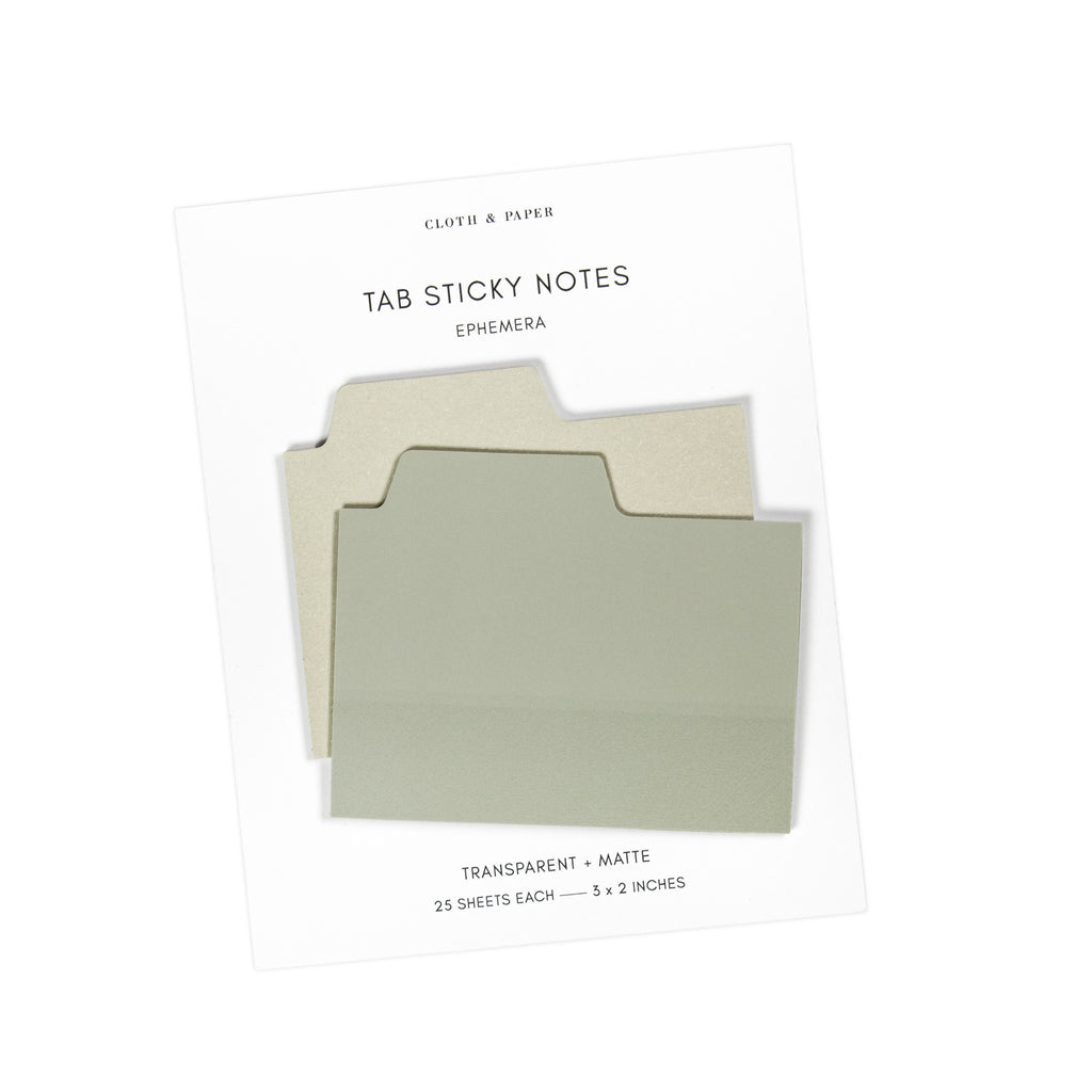 Blank Tab Sticky Note Set, Ephemera, Cloth and Paper. Sticky note set displayed against a white background. The matte sticky note pad is attached to the sticky note backing, while the transparent sticky note pad is layered on top of it, turned slightly to the right.