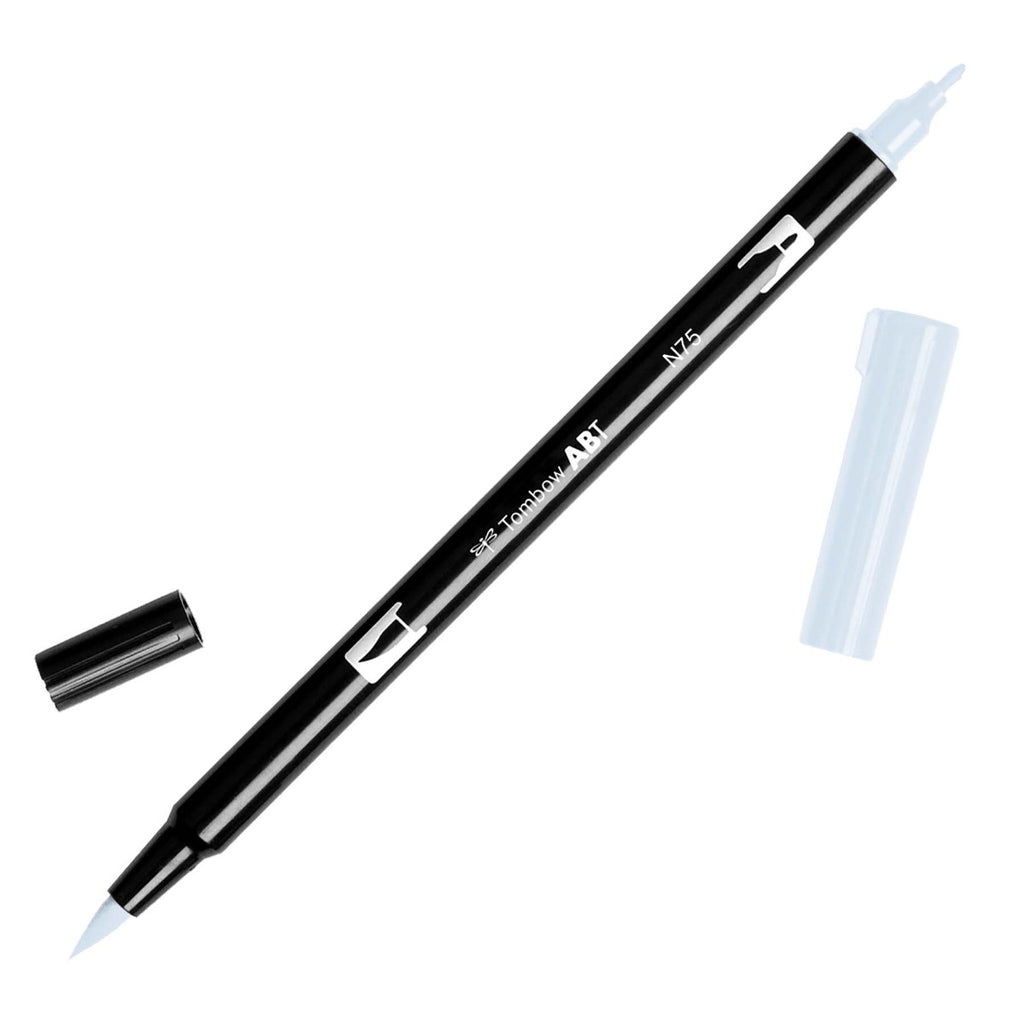 Tombow Dual Brush Art Marker, Cool Gray 3, Cloth & Paper. Art marker turned slightly to the right on a white background. It is uncapped on both ends showing the brush tip and fine tip.