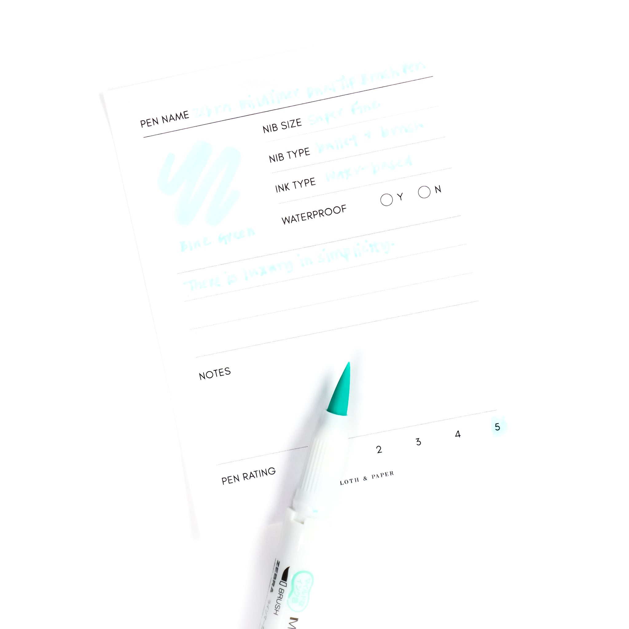 https://www.clothandpaper.com/cdn/shop/products/zebra-mildliner-dual-tip-brush-pen-blue-green-writing-sample-1.jpg?v=1643910814