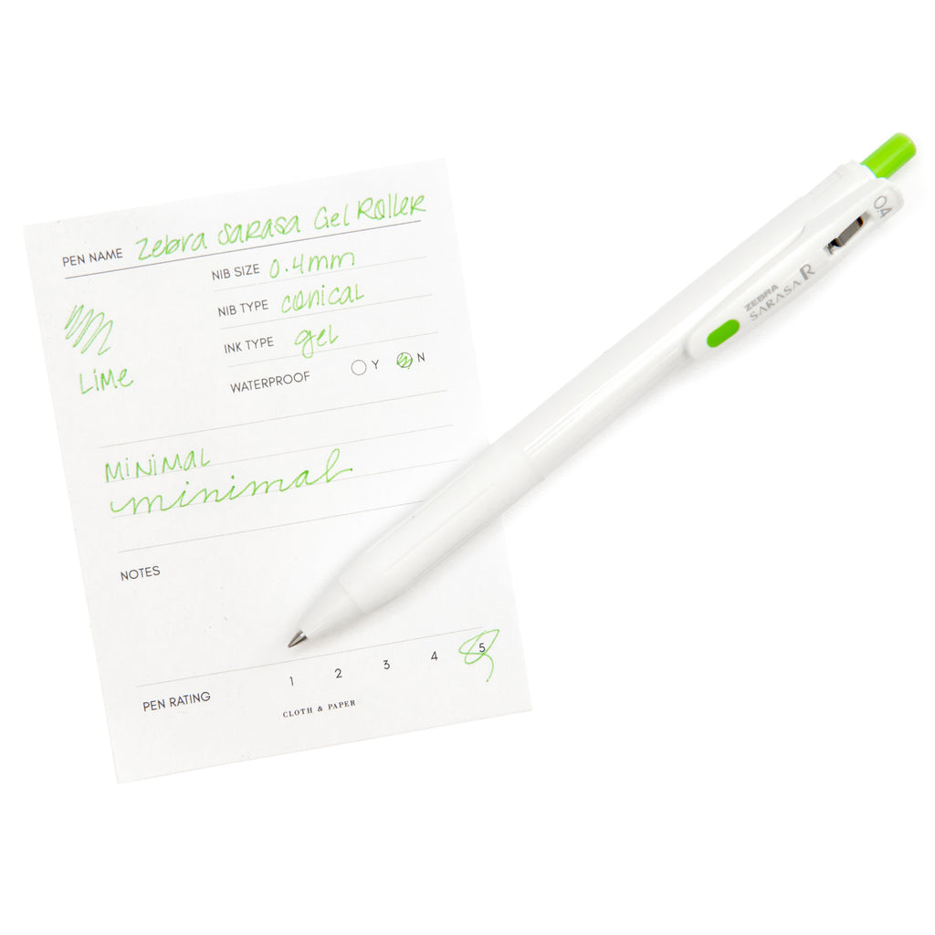 Zebra Sarasa R Pen, 0.4 mm, Fresh Green, Cloth and Paper. Pen resting on pen test sheet displaying writing sample.